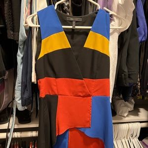 Sleeve less blouse with different colors. Like new